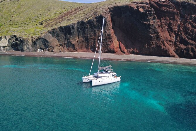 Santorini: Luxury Catamaran Cruise with Fresh Fish BBQ & Drinks - Sunset, Photos, and the Return to Port