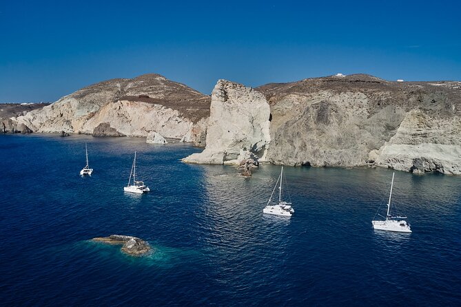 Santorini: Luxury Catamaran Cruise with Fresh Fish BBQ & Drinks - Red Beach and the Change to White Beach