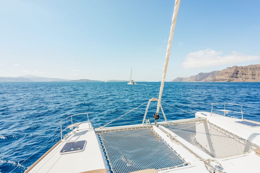 Santorini: Luxury Catamaran Day Trip with Meal and Open Bar - Why seeing Santorini from the water matters
