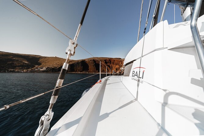Santorini Luxury Catamaran Private Cruise - Vlichada start and the first stretch along the south coast