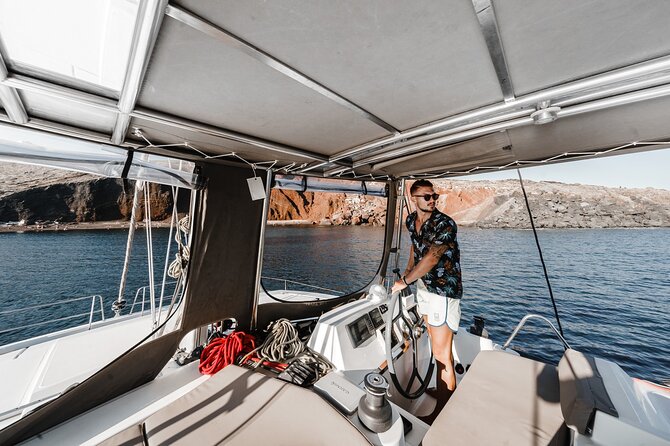 Santorini Luxury Catamaran Private Cruise - A Greek meal, local drinks, and time on deck
