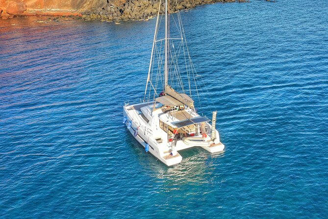 Santorini Luxury Catamaran Private Cruise - Red Beach, White Beach, and the coastal caves