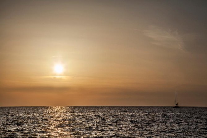 Santorini: Motor Yacht Sunset Cruise with 5-Course Dinner - Timing, weather, and booking details