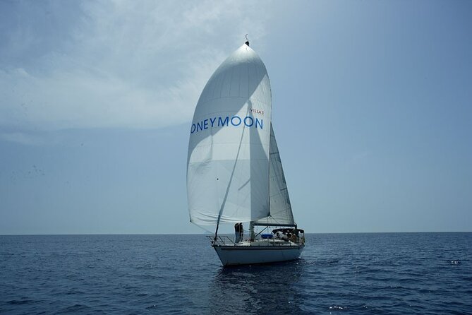 Santorini Oia: Private Sailing Yacht Cruise with Meal and Drinks - Thirassia: a calm first swim near Oia