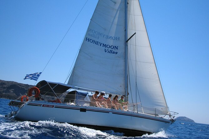 Santorini Oia: Private Sailing Yacht Cruise with Meal and Drinks - The volcanic coast and Santorini’s sulfur springs
