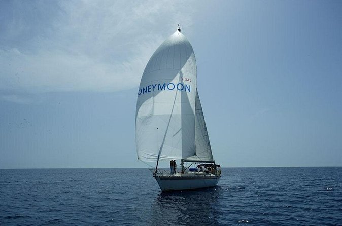 Santorini Oia: Private Sailing Yacht Cruise with Meal and Drinks - Food, drinks, towels, and snorkeling gear