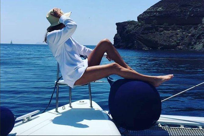 Santorini Platinum Catamaran Cruise with Meal, BBQ and Open Bar - Mesa Pigadia, the first swim stop