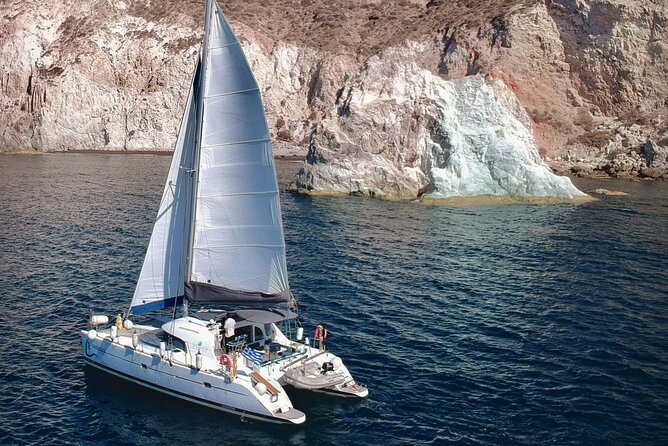 Santorini: Premium Small-Group Catamaran Cruise with Food/Drinks - Pickup at Vlychada and the first minutes on board