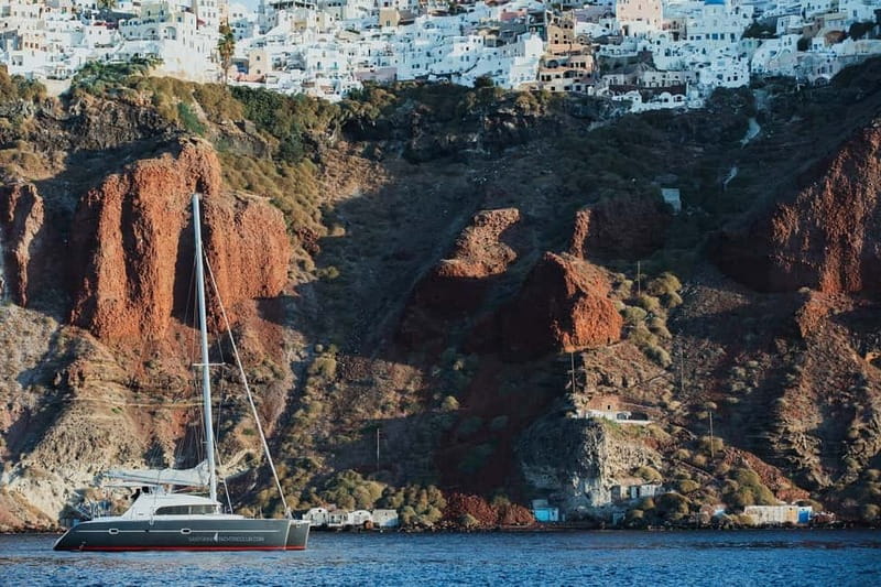 Santorini: Private Catamaran Cruise with BBQ Meal and Drinks - Why Santorini looks better from the caldera