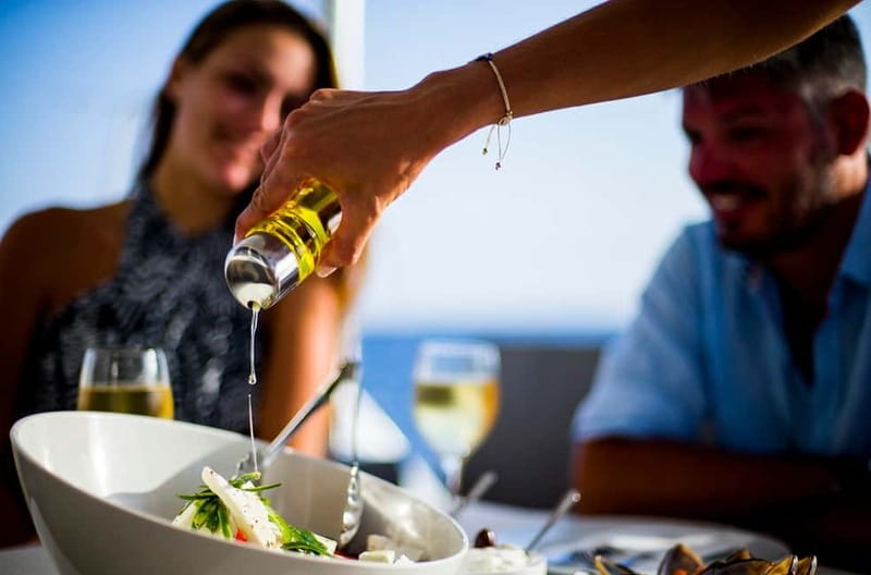 Santorini: Private Catamaran Cruise with BBQ Meal and Drinks - Thirassia and the quiet side of Santorini
