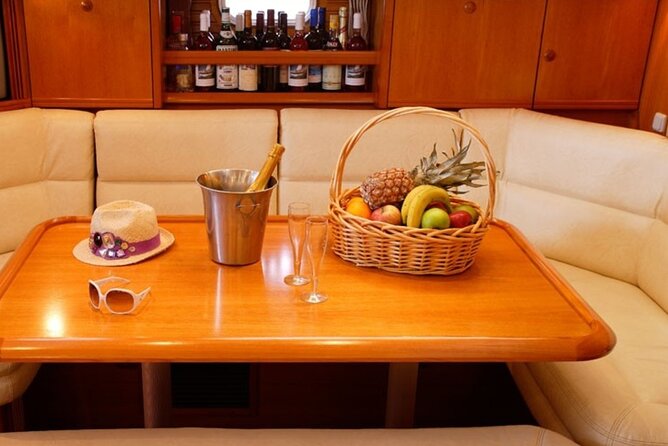 Santorini: Private Sailing Yacht Cruise with Meal and Drinks - Food, drinks, and snorkeling gear improve the value