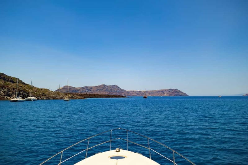 Santorini: Private Yacht Experience of Timeless Elegance - Red Beach and White Beach from the sea
