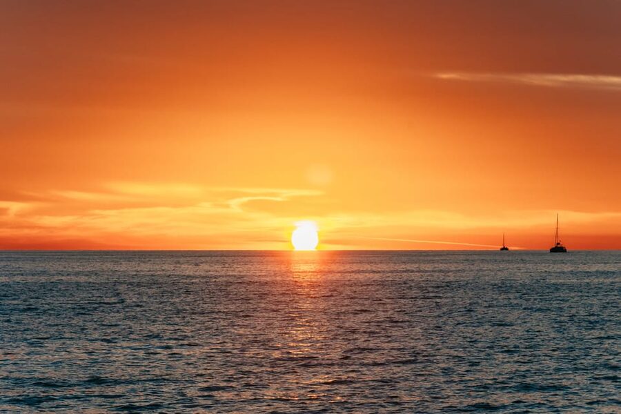 Santorini: Sailing Catamaran Cruise with BBQ and Drinks - Choosing the morning or sunset cruise