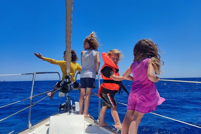 Santorini Semi-private Morning or Sunset Volcano Sailing Tour - Kameni combines swimming, wine, and a proper meal