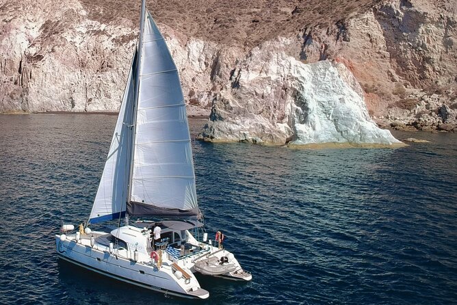 Santorini: Standard Small-Group Catamaran Cruise with Food/Drinks - White Beach, Indian Rocks, and the lighthouse are photo stops