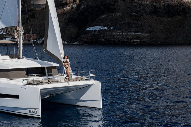 Shared Catamaran Half Day Cruise in Santorini - Pickup at Athinios Port and what to expect