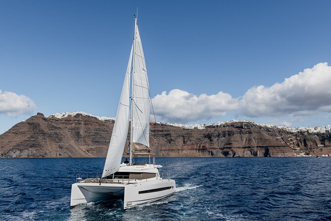 Shared Catamaran Half Day Cruise in Santorini - Mesa Pigadia for a quieter swim