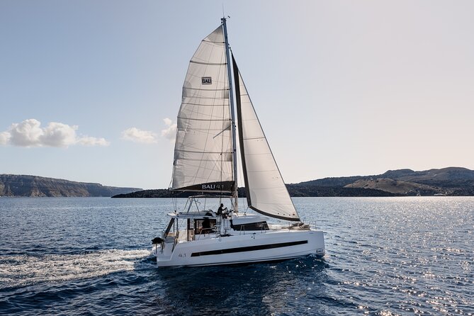 Shared Catamaran Half Day Cruise in Santorini - The Akrotiri Lighthouse from the sea