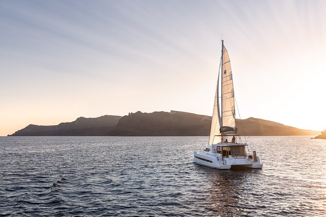 Shared Catamaran Half Day Cruise in Santorini - White Beach and the first volcanic colors