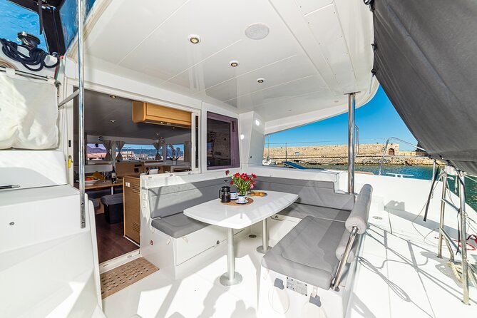 Small Group Santorini Catamaran Cruise with BBQ - The Volcano and Warm Hot Springs