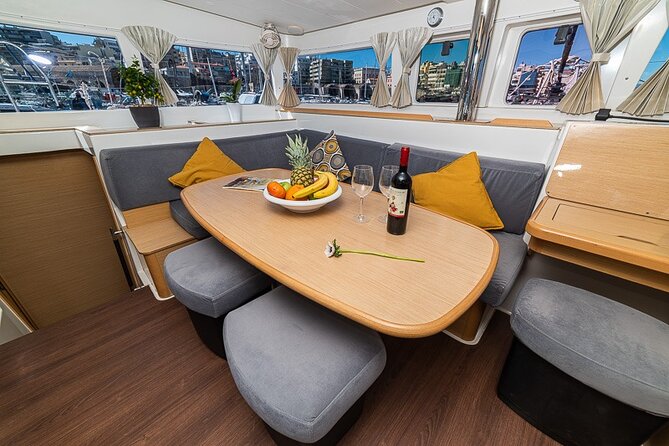 Small Group Santorini Catamaran Cruise with BBQ - Pickup, Group Size, and Practical Details