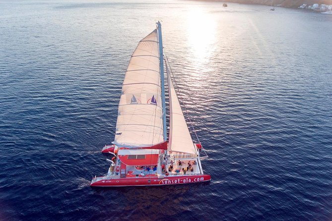 Sunset Sailing Catamaran Cruise in Santorini with BBQ and Drinks - Crew service and the feel on board